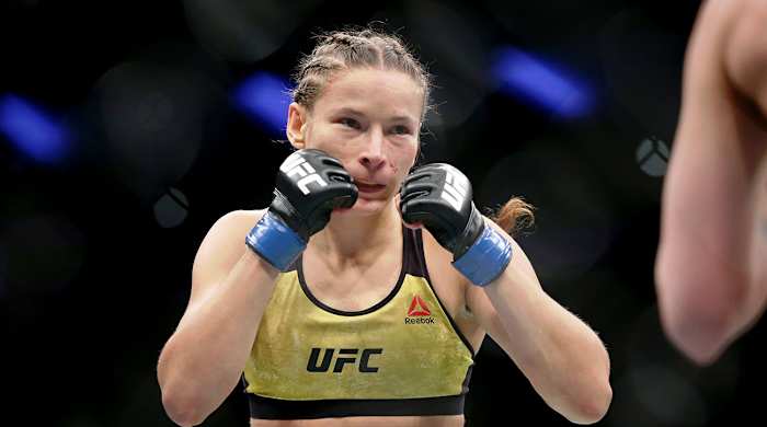 Sabina Mazo (red gloves) fights Maryna Moroz (blue gloves) during UFC Fight Night at Wells Fargo Arena.